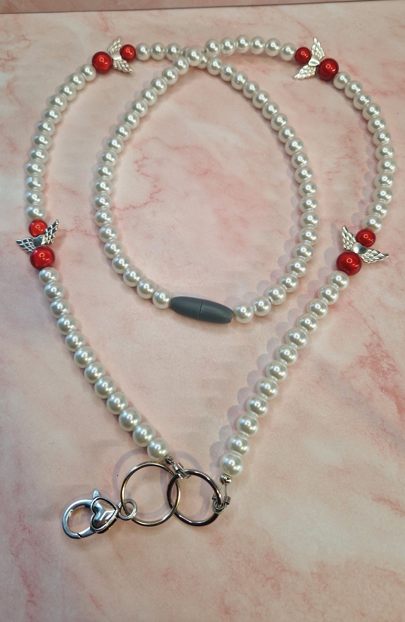 Ihastuttava enkeliavainnauhakoru Marinkorut