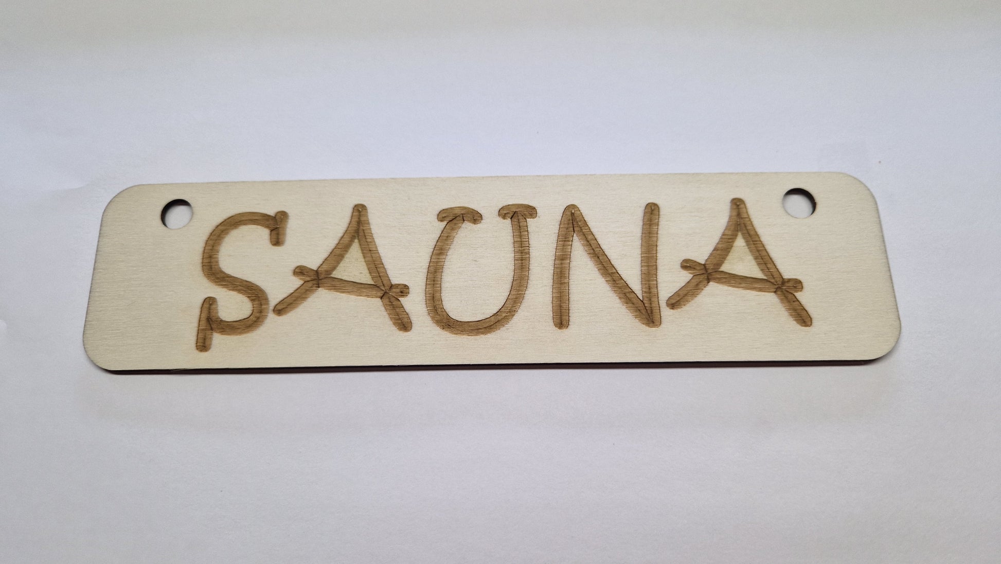 Sauna-aiheiset kyltit Marinkorut
